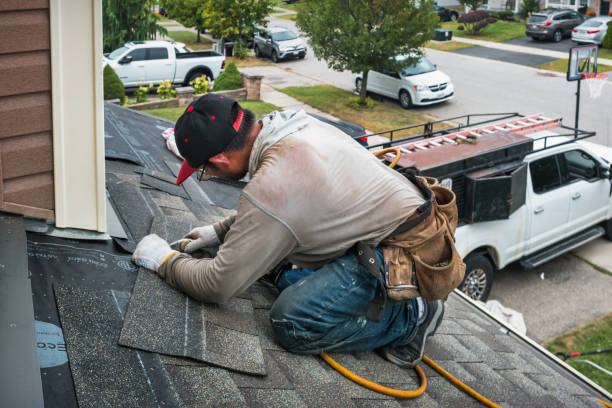 Professional Gutter Repair And Installation technician working in Campbell, OH